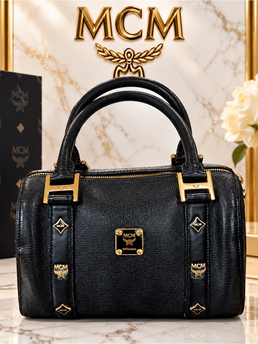 MCM Black Leather Satchel with Gold Accents